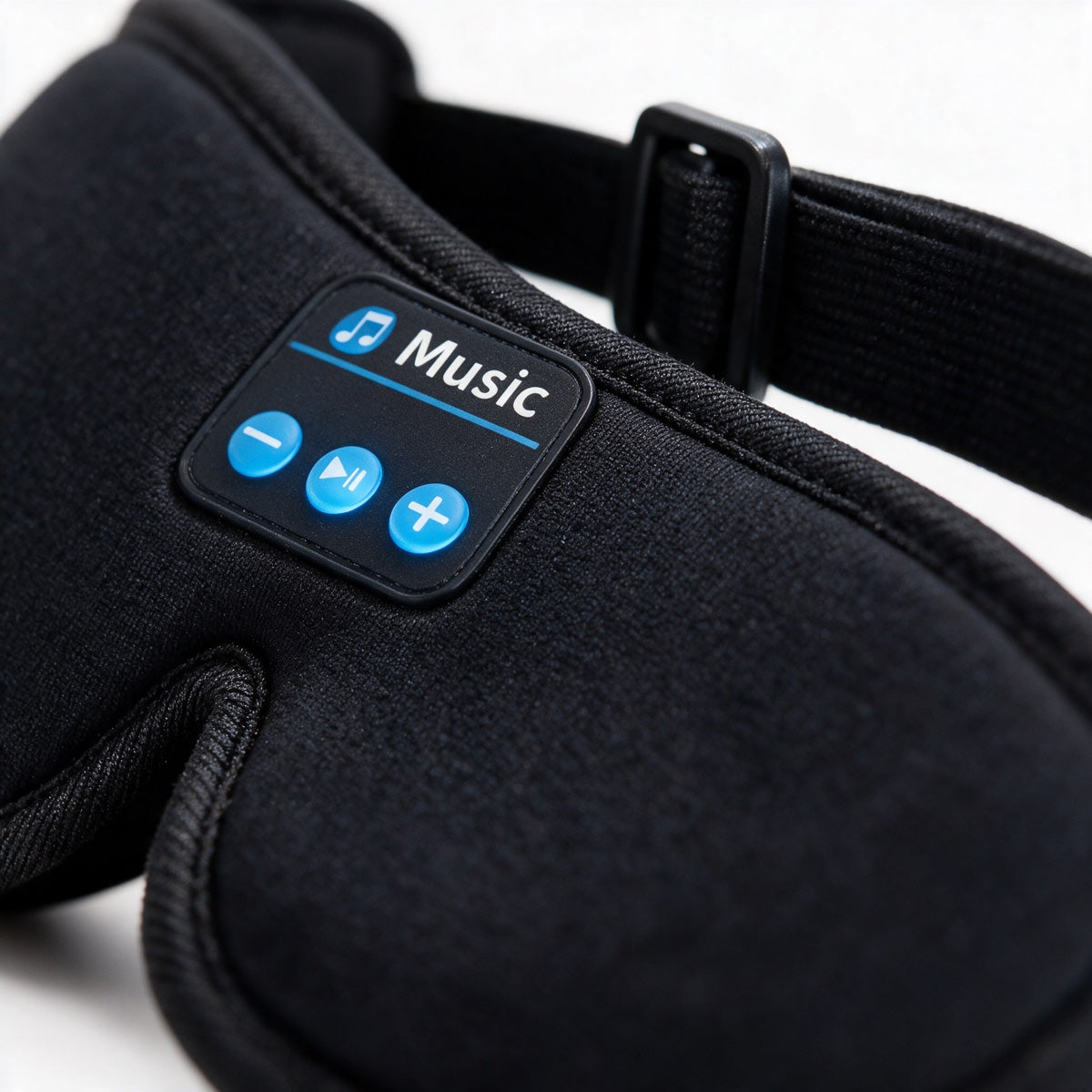 Close-up of the play and volume buttons on the Bluetooth sleep mask